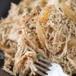Easy all-purpose shredded chicken made in the crockpot with spices and beer.  Make a big batch and use it to make different meals all week long! | #chicken #shreddedchicken #pulledchicken #beer #braised #allpurpose #multipurpose #slowcooker #crockpot