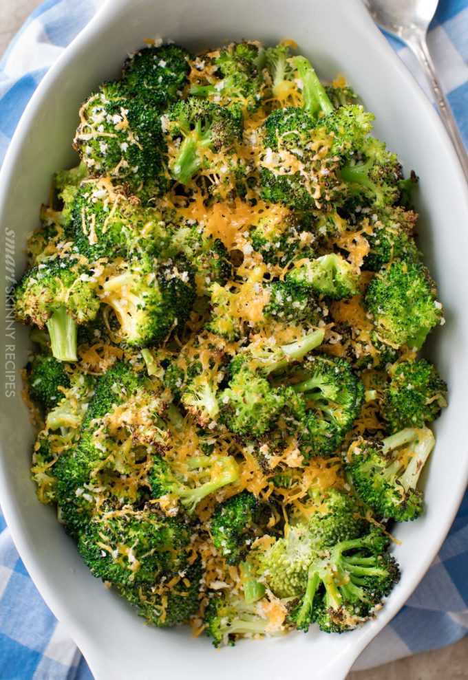 Roasted broccoli in baking dish with cheese