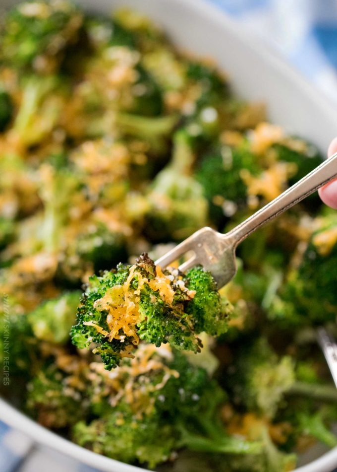 Forkful of roasted broccoli with cheese