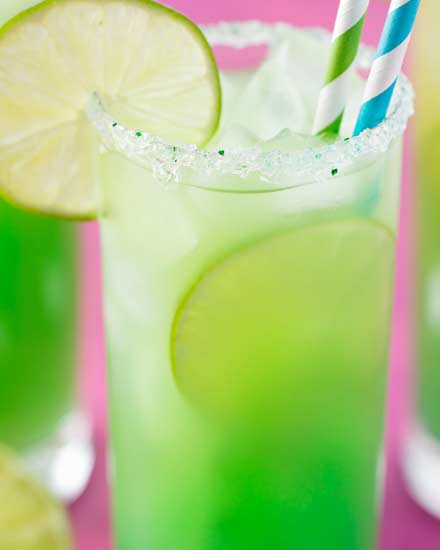 Tropical, sweet, and beautifully colored, this is one rum punch you have to try! #rum #rumpunch #punch #summer #drink #cocktail #mermaid