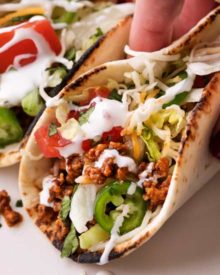Have dinner ready to go when you come home with these crockpot beef tacos! The taco meat is slow simmered and incredibly tender and juicy! #tacos #tacotuesday #taconight #beeftacos #slowcooker #crockpot #weeknightdinner #instantpot #pressurecooker