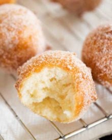 The tastiest homemade donut holes, ready in about 30 minutes, with no rolling or yeast to deal with. Mix, fry, eat! Breakfast is served! #breakfast #donut #doughnut #homemade #donutholes #easyrecipe