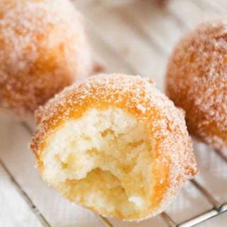 The tastiest homemade donut holes, ready in about 30 minutes, with no rolling or yeast to deal with. Mix, fry, eat! Breakfast is served! #breakfast #donut #doughnut #homemade #donutholes #easyrecipe