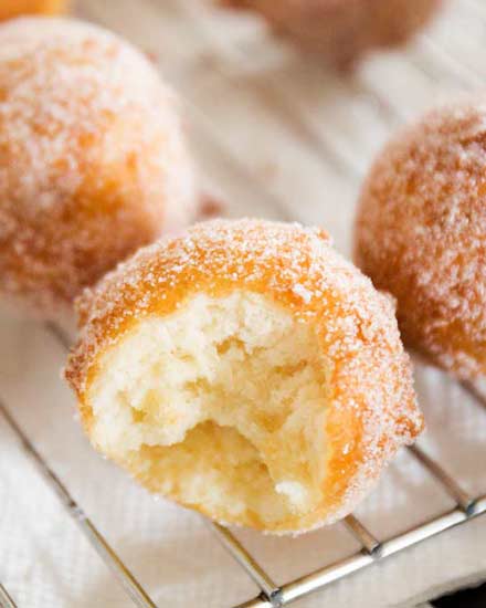 The tastiest homemade donut holes, ready in about 30 minutes, with no rolling or yeast to deal with.  Mix, fry, eat!  Breakfast is served! #breakfast #donut #doughnut #homemade #donutholes #easyrecipe