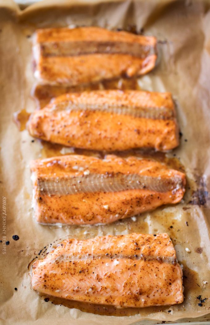 Salmon filets on baking sheet