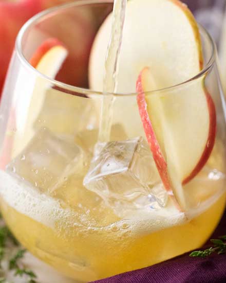 These apple bourbon cocktails are incredibly refreshing and a great mix of sweet with a bit of tartness. Take advantage of those Fall apples! #bourbon #cocktailrecipe #cocktails #applecider #honeycrisp #maplesyrup #falldrink #alcohol #fall