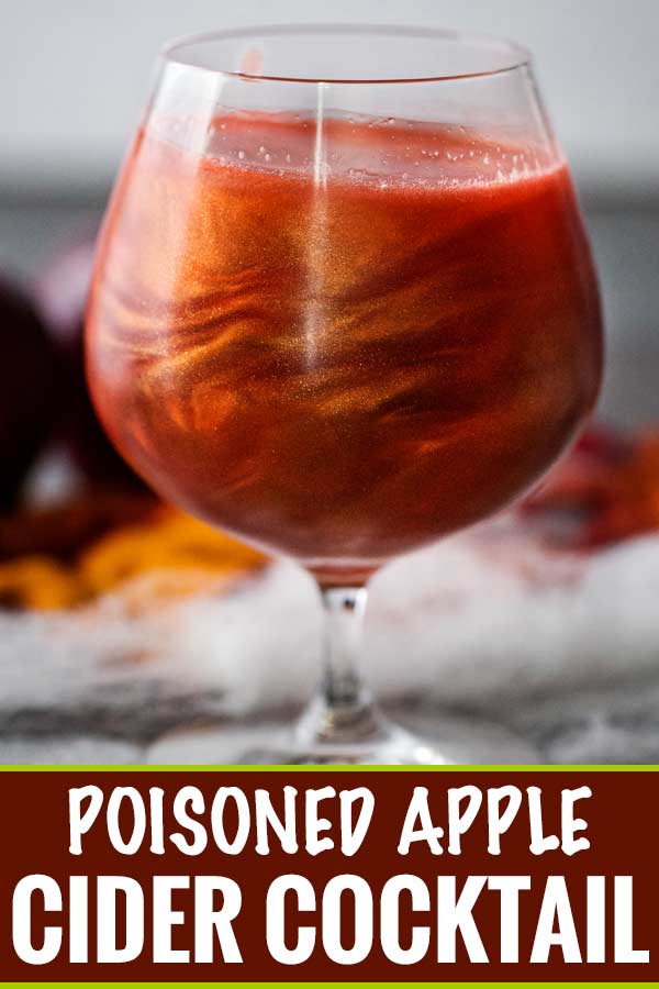 Perfect for Fall and Halloween, this sweet and eerily beautiful cocktail is made with just a handful of ingredients, and tastes every bit as great as it looks! #cocktail #drink #applecider #Halloween #Fall #falldrink #drinks #lusterdust #viniq 