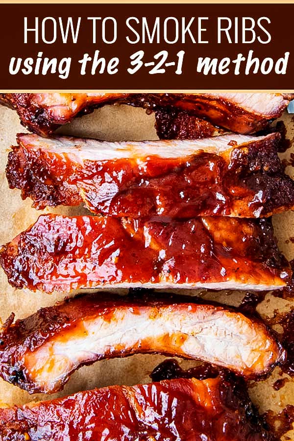 Delicious homemade smoked ribs are easier to make than you think, especially using the popular 3-2-1 method.  Fall of the bone tender, and lip-smackingly good, these ribs are FABULOUS!! #ribs #pork #bbq #smoked #smoking #grilling #easyrecipe