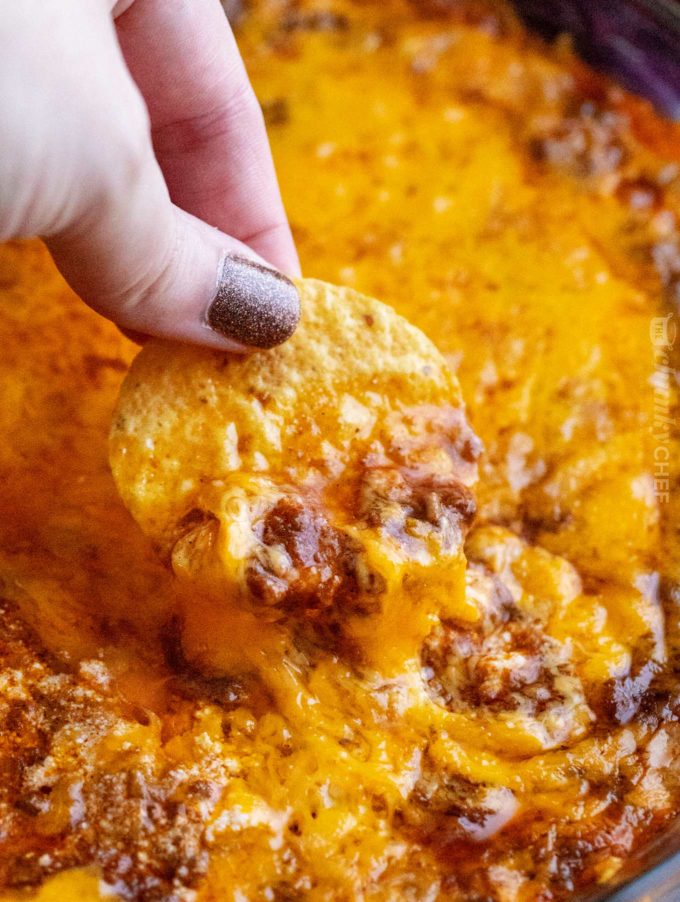 Cheesy skyline dip with tortilla chips