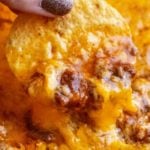 This 3 ingredient chili cheese dip (also known here in the Midwest as Skyline Dip), is always the perfect game day or party appetizer! #dip #chili #cheese #chilicheese #skyline #appetizer #gameday #partyfood #easyrecipe