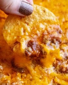 This 3 ingredient chili cheese dip (also known here in the Midwest as Skyline Dip), is always the perfect game day or party appetizer! #dip #chili #cheese #chilicheese #skyline #appetizer #gameday #partyfood #easyrecipe