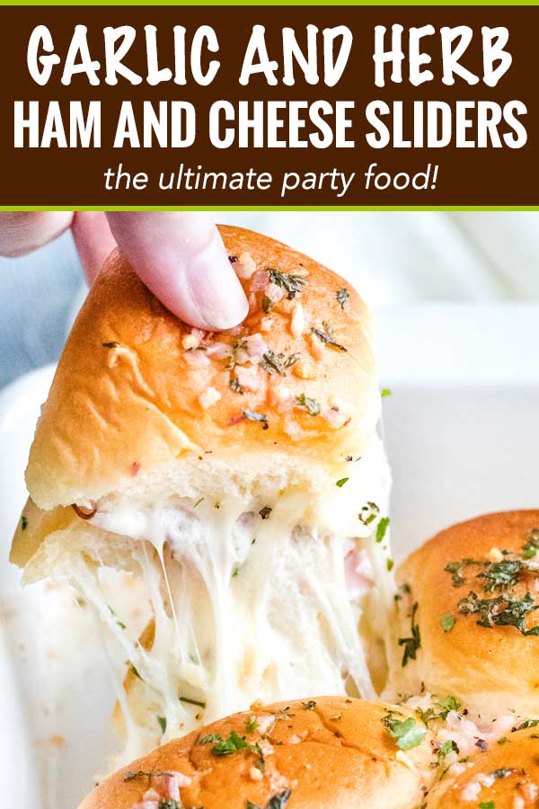 The ultimate party or finger food, these melt in your mouth ham and cheese sliders are made savory with the addition of garlic and herbs, drizzled in a garlic/shallot butter and baked until tender and golden! #appetizer #partyfood #fingerfood #sliders #hamandcheese #garlicandherb #easyrecipe