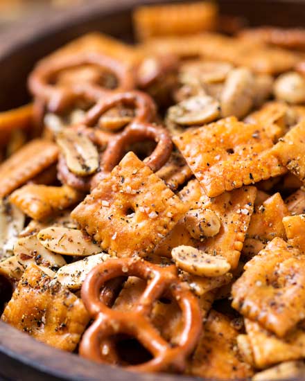 Baked to buttery perfection, this Italian herb snack mix is the perfect after school or party snack. No need to eat bagged snacks, homemade is really easy! #snackmix #snacks, #partyfood #chexmix #italianherb