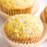 Bakery-style lemon poppy seed muffins with grated zucchini that have the most amazingly soft and fluffy texture, and are complete with a crunchy sugary crust on top! #muffins #lemon #poppyseed #zucchini #bakerystyle #easyrecipe #brunch #breakfast