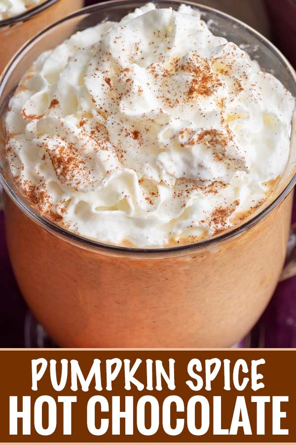 This pumpkin spice hot chocolate is made with white chocolate and real canned pumpkin... and tastes like pumpkin pie in a mug!  Warm up this Fall! #pumpkin #pumpkinspice #hotchocolate #whitechocolate #Fall #falldrink #hotcocoa