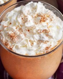 This pumpkin spice hot chocolate is made with white chocolate and real canned pumpkin... and tastes like pumpkin pie in a mug! Warm up this Fall! #pumpkin #pumpkinspice #hotchocolate #whitechocolate #Fall #falldrink #hotcocoa