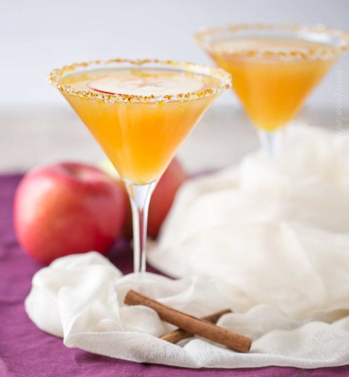 Two caramel apple martinis with sugar rims