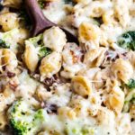 Ultra creamy and rich, this Cheesy Chicken Casserole with Broccoli and Bacon is a great weeknight dinner that the whole family will LOVE! #casserole #skillet #chicken #kidfriendly #weeknightdinner #weeknightrecipe #easyrecipe #dinner #cheesy