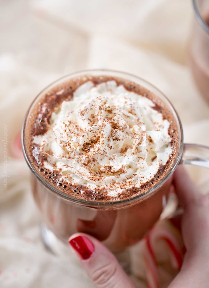 Rich and creamy, Mexican hot chocolate will warm you up from the inside out! Made with melted chocolate, vanilla, cinnamon and a pinch of cayenne for kick, this recipe is easy to spike for an adult beverage treat! #hotchocolate #mexicanhotchocolate #holidaydrink #hotchocolaterecipe #easyrecipe #homemade #hotcocoa