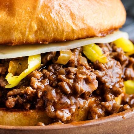 Tangy and savory Mississippi pot roast flavors come together in this quick-cooking sloppy joe recipe!  Perfect for a kid-friendly weeknight meal! #sloppyjoe #mississippiroast
