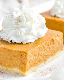 Great classic pumpkin pie flavors without the hassle of dealing with pie crust! Make your Thanksgiving easier with these Shortbread Pumpkin Pie Bars... perfect for a larger crowd! #pumpkinpie #pumpkin #Thanksgiving #crowd #shortbread #hasslefree #easyrecipe #bars
