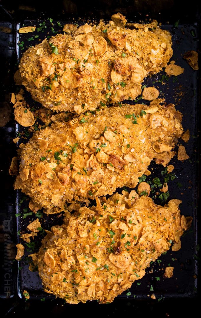 Cornflake chicken breasts in baking dish