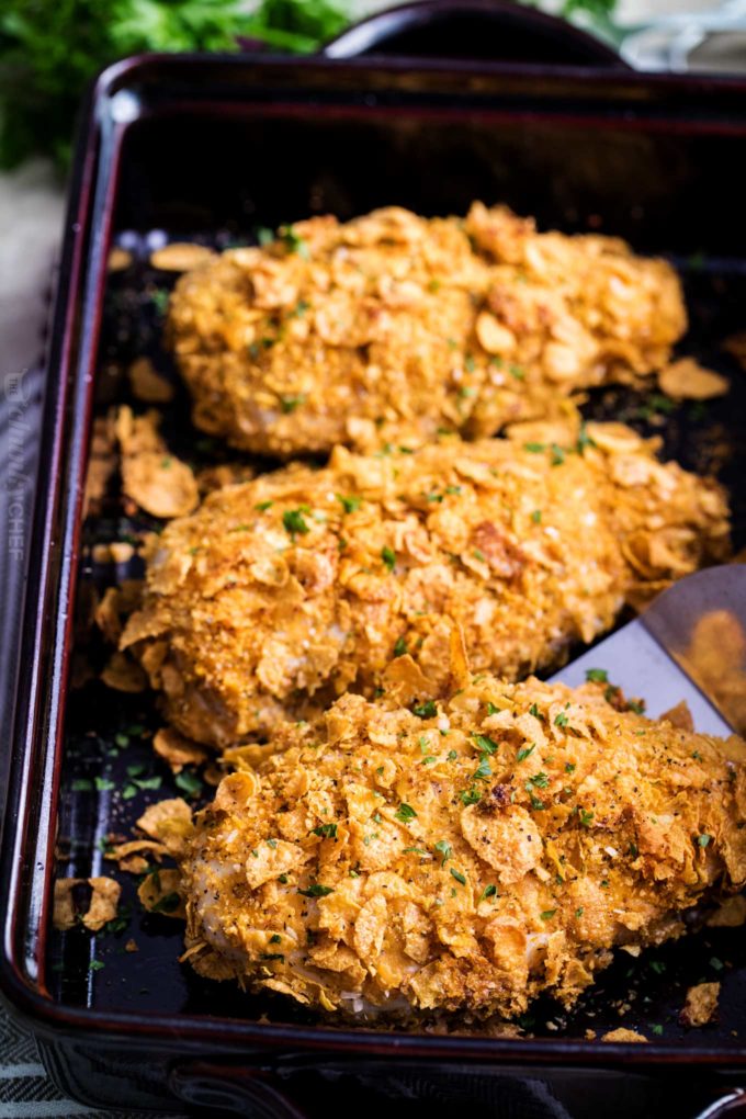 Baked chicken with cornflake crust in baking dish