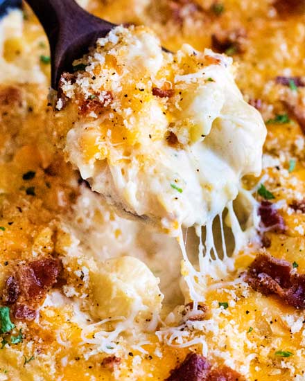 Creamy mac and cheese, made with double the cheeses, chipotle peppers, crispy bacon, and a buttery panko topping!  Perfect for a weeknight comfort food meal! #macandcheese #macaroni #bacon #chipotle #smoky #comfortfood #weeknightmeal #easyrecipe #homemade