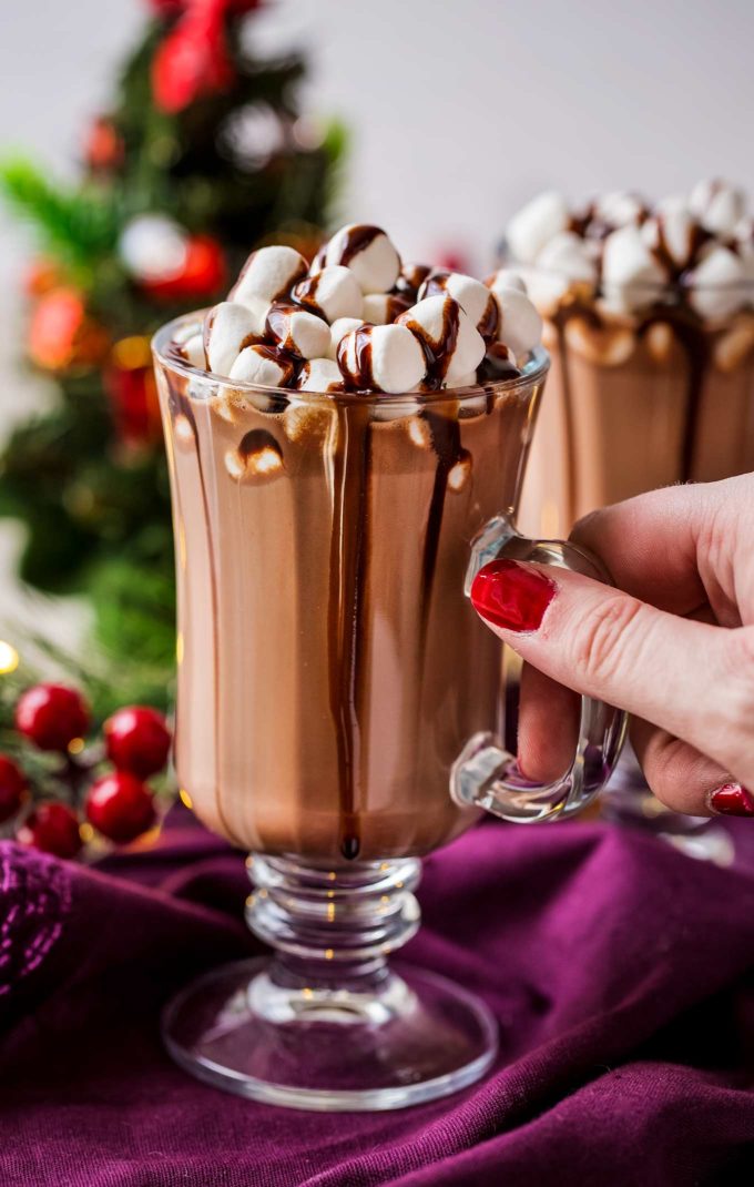 Grabbing a mug of nutella crockpot hot chocolate