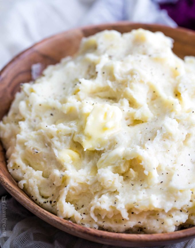 Homestyle mashed potatoes in wooden bowl