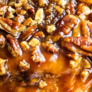 Deliciously tender, sweet and sticky, these sticky buns are made with a homemade maple-caramel sauce that is out of this world! #stickybuns #sweetrolls #cinnamonbun #pecan #caramel #holiday #breakfast #dessert