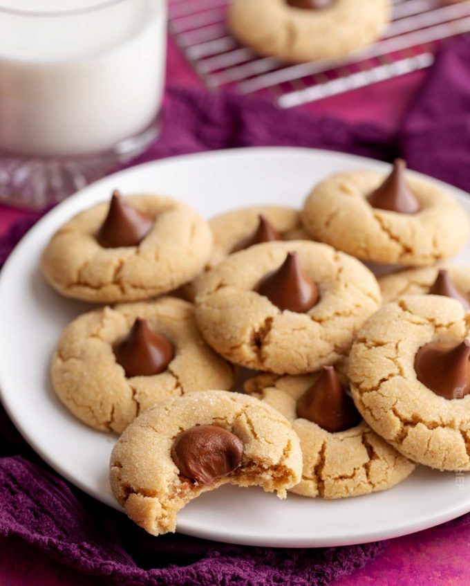 Peanut butter blossoms cookie with bite taken out of it