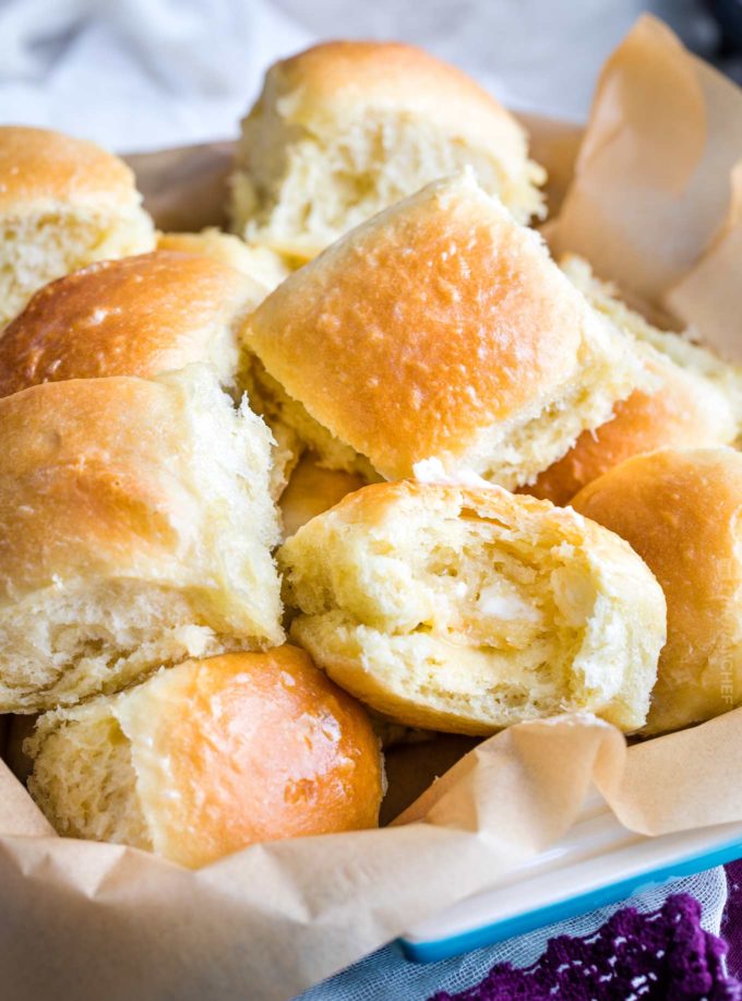 These easy, foolproof homemade dinner rolls served with whipped honey butter are perfect for your Thanksgiving or holiday dinners!  With a make-ahead option, you'll be amazed at how easy it is to make bakery-quality rolls in your own kitchen! #dinnerrolls #rolls #thanksgiving #bread #homemaderecipe #yeast #honeybutter