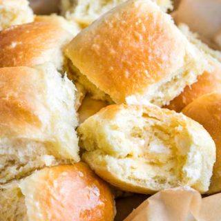 These easy, foolproof homemade dinner rolls served with whipped honey butter are perfect for your Thanksgiving or holiday dinners! With a make-ahead option, you'll be amazed at how easy it is to make bakery-quality rolls in your own kitchen! #dinnerrolls #rolls #thanksgiving #bread #homemaderecipe #yeast #honeybutter