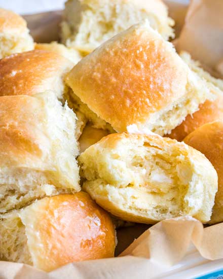 These easy, foolproof homemade dinner rolls served with whipped honey butter are perfect for your Thanksgiving or holiday dinners!  With a make-ahead option, you'll be amazed at how easy it is to make bakery-quality rolls in your own kitchen! #dinnerrolls #rolls #thanksgiving #bread #homemaderecipe #yeast #honeybutter