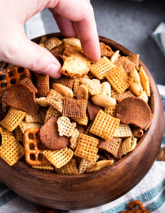 Grabbing a handful of slow cooker chex mix