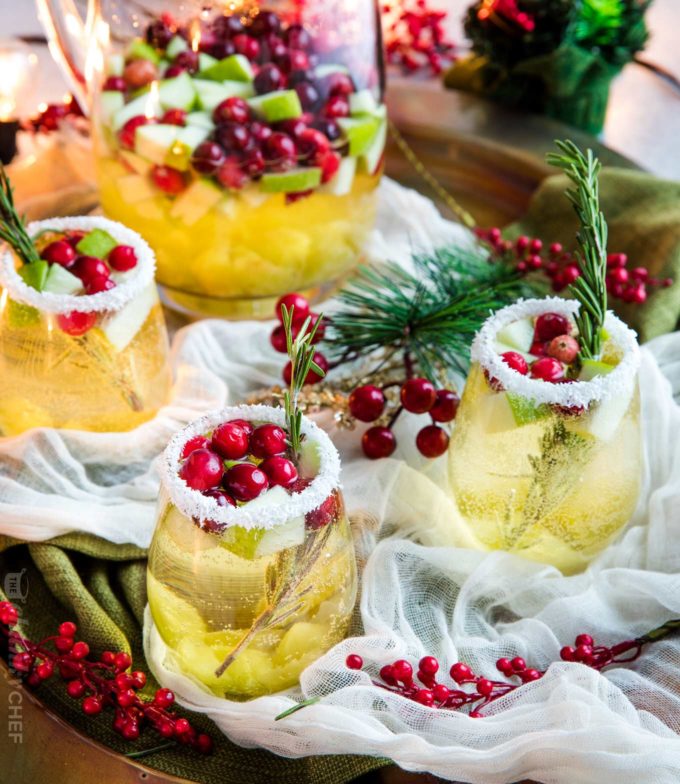 White sangria in glasses with Christmas decor