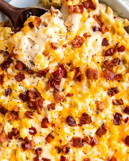 Delicious combo of chicken, bacon, ranch, and a mac and cheese made with three cheeses!  Family-friendly, make-ahead friendly, and perfect for a weeknight dinner! #macandcheese #chickenbaconranch #crackchicken #bakedmac #macaroniandcheese #easyrecipe #weeknightdinner #casserole