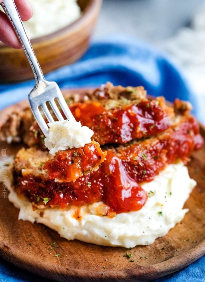 Forkful of mashed potatoes and meatloaf
