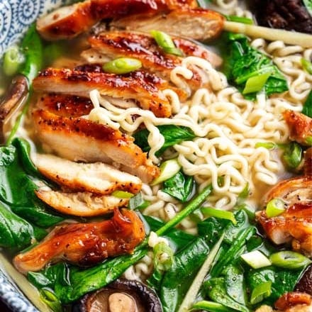 Perfect for a chilly weeknight, this Ginger Glazed Chicken Ramen recipe is ready in about 30 minutes and tastes like you spent hours slaving over it!  Rich broth, sweet and savory chicken, and classic noodles... perfect Asian comfort food! #ramen #ramenrecipe #chicken #asian #30minutemeal #easyrecipe #weeknightrecipe #ramennoodles