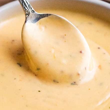 Just like the beer cheese from your favorite pub, this easy beer cheese sauce is made in 15 minutes or less, and PERFECT for dipping or topping your favorite foods! #beer #cheese #beercheese #appetizer #party #dip #sauce #gameday #easyrecipe