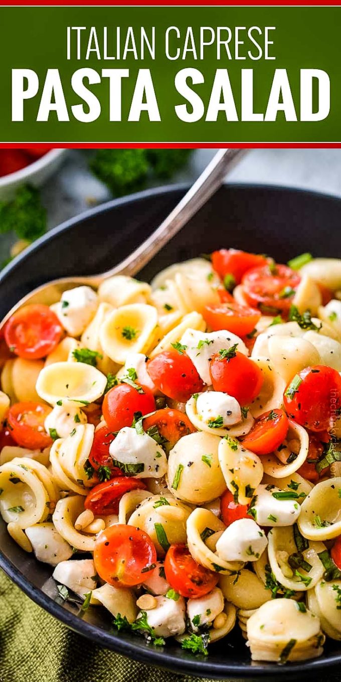 Caprese pasta salad made with tomatoes, marinated fresh mozzarella cheese, fresh basil, and a mouthwatering homemade Italian herb vinaigrette! #pastasalad #caprese #tomatobasil #italian #sidedish #potluck #bbq #summer