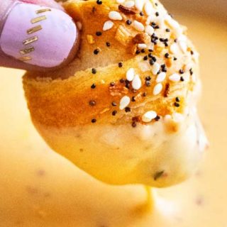 Classic pigs in a blanket, made with cocktail franks and flaky crescent rolls, baked with sprinkle of savory "everything" bagel seasoning! Always a crowd-pleaser, make these 4 ingredient gems for your next party! #pigsinablanket #crescentrolls #lilsmokies #everything #bagelseasoning #appetizer #partyfood #easyrecipe