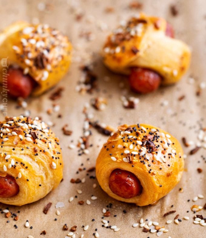 Pigs in a blanket on baking sheet