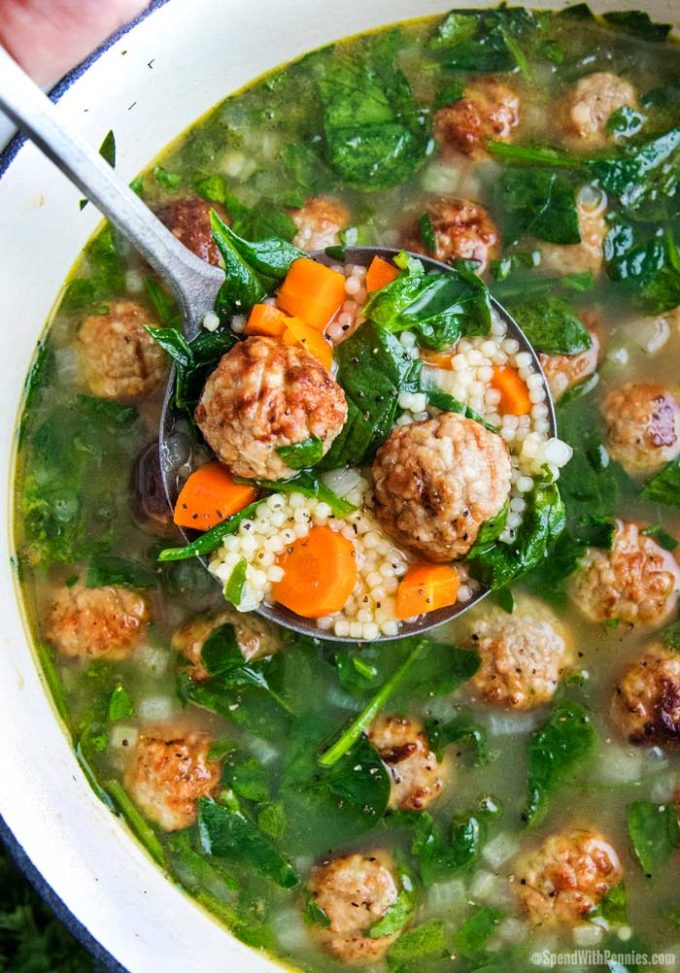 Italian wedding soup in ladle