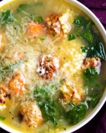 Light and filling, this Italian Wedding Soup is perfectly delicious comfort food, all year round. Made in one pan, and ready in 30 minutes, this recipe is great for a weeknight meal! #soup #souprecipe #Italianweddingsoup #onepot #30minutemeal #weeknight #dinner #easyrecipe #homemaderecipe