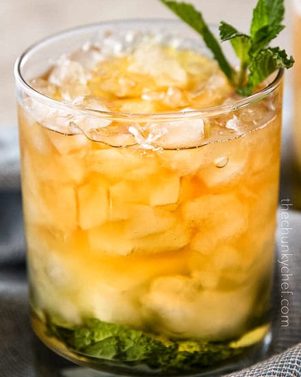 This Southern mint julep recipe is pretty close to the iconic Derby Day cocktail, made with simple syrup, Kentucky bourbon, fresh mint, and crushed ice.  Cool and refreshing, it's perfect on a summer day! #mintjulep #bourbon #derbyday #cocktail #mint #kentucky #southern #sipper