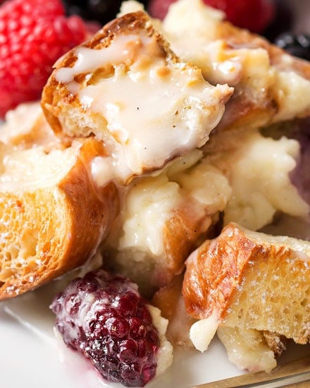 Whip up this sweet croissant breakfast casserole the night before, let it sit overnight, then bake it to crispy yet creamy perfection. Drizzle it with vanilla bean glaze and prepare to fall in love! #holiday #breakfast #easter #mothersday #overnight #breakfastbake #croissant #breakfastrecipe #easyrecipe #makeahead