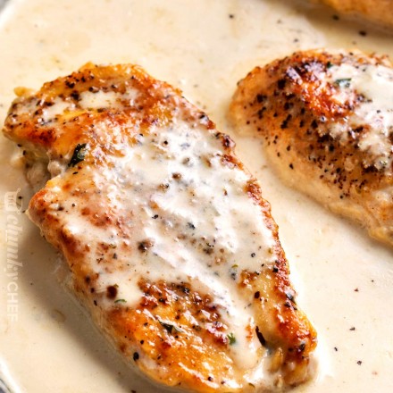 Creamy garlic chicken breasts in pan