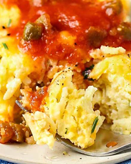 Perfect for feeding a crowd or a hungry family on the weekend, this hashbrown casserole is comforting, cheesy, full of fresh veggies, and can be made ahead for a busy holiday! #casserole #hashbrown #breakfast #easyrecipe #cheesy #vegetarian #baked #makeahead #overnight #holiday